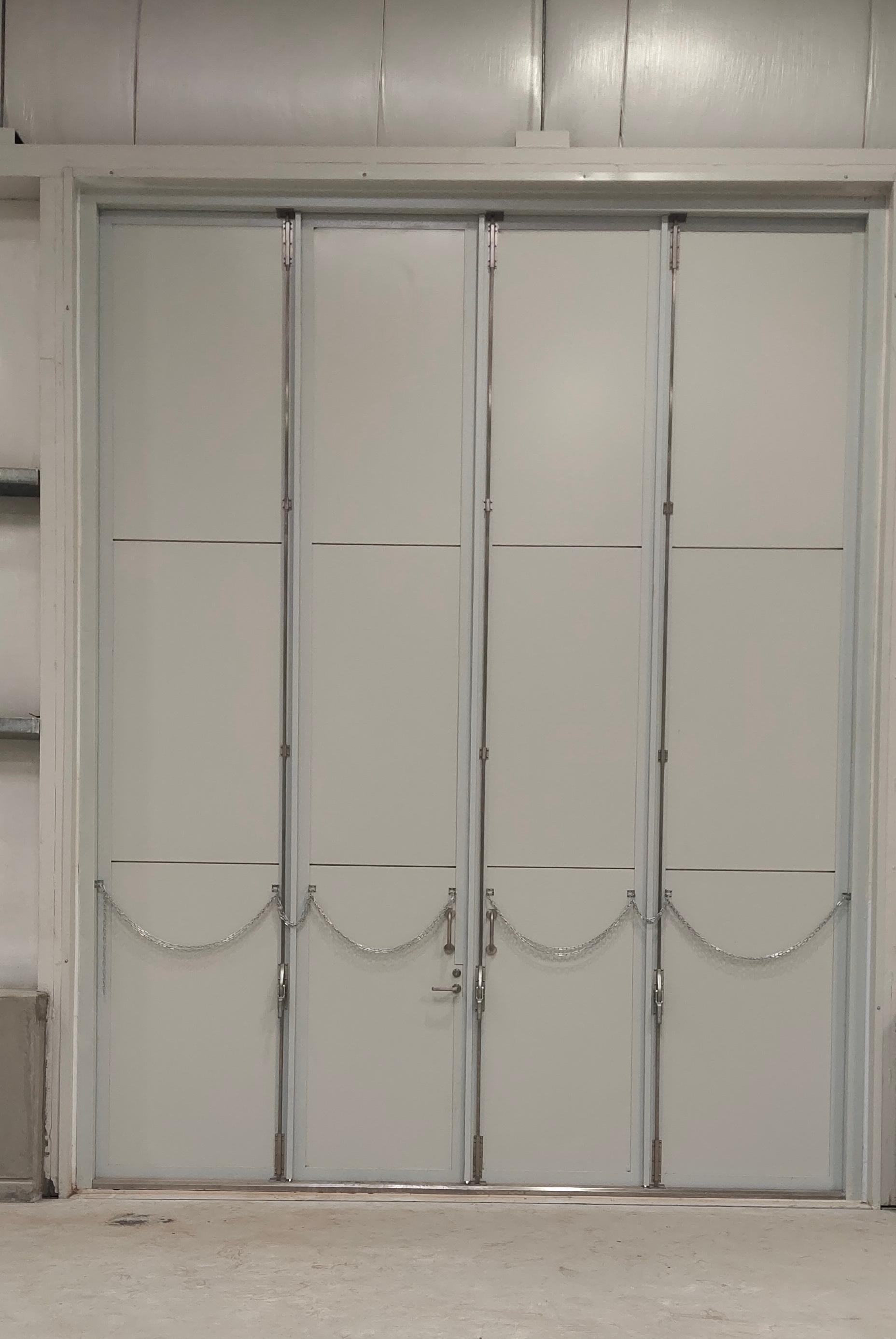 Vertical hinged door